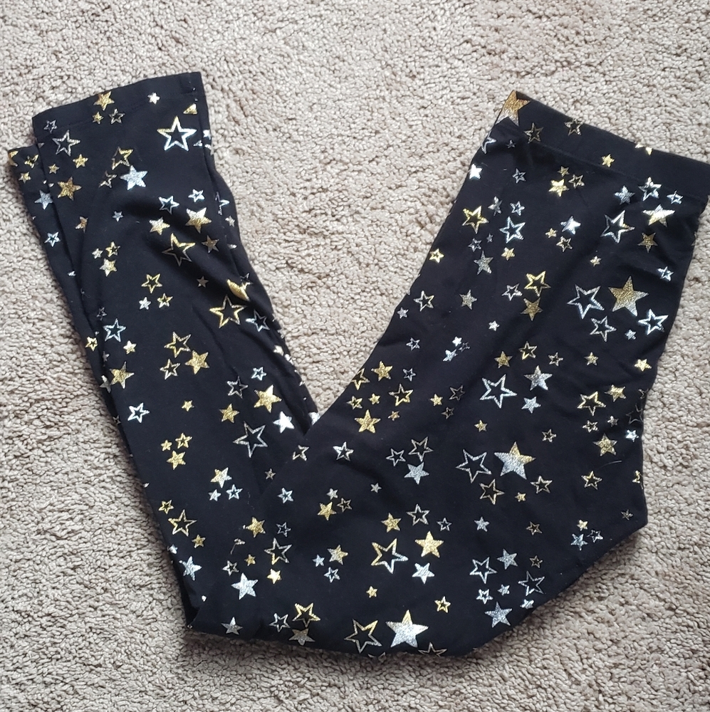 Girls black with silver and gold star leggings